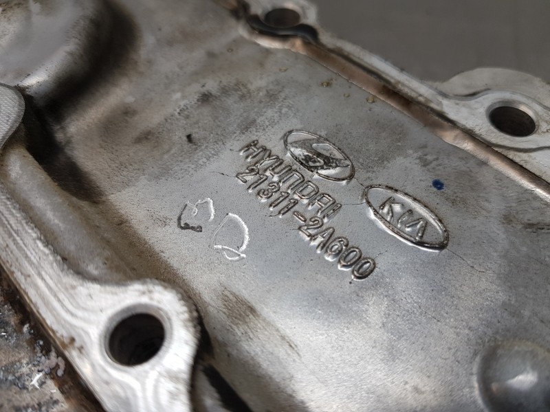 Recambio de tapa distribucion para hyundai tucson ix35 referencia OEM IAM 213102A600  