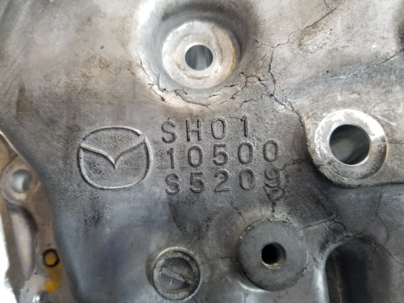 Recambio de tapa distribucion para mazda 3 lim. () style referencia OEM IAM ZJ3810500  