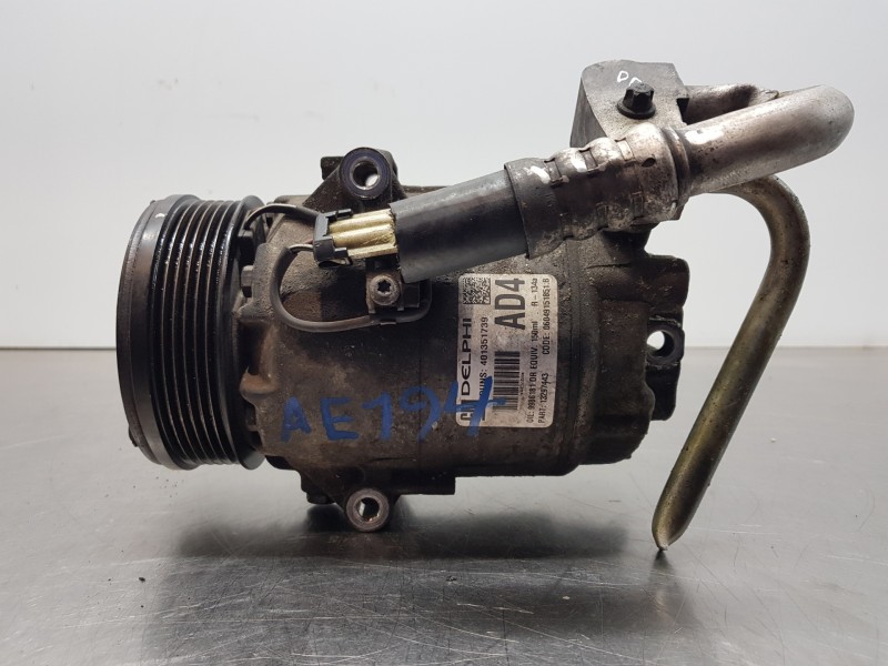 Recambio de compresor aire acondicionado para opel astra h caravan ecoflex referencia OEM IAM 13297443  