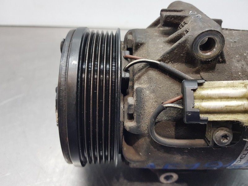 Recambio de compresor aire acondicionado para opel astra h caravan ecoflex referencia OEM IAM 13297443  