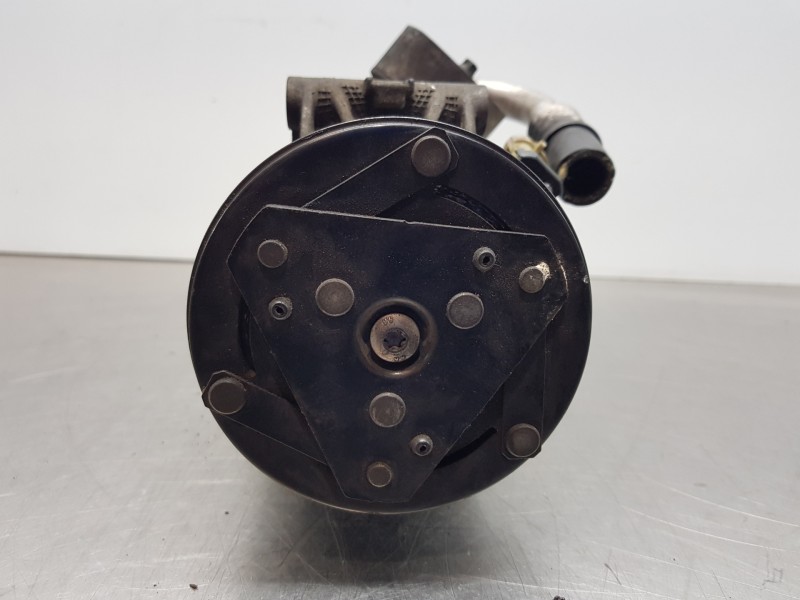 Recambio de compresor aire acondicionado para opel astra h caravan ecoflex referencia OEM IAM 13297443  
