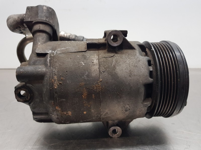 Recambio de compresor aire acondicionado para opel astra h caravan ecoflex referencia OEM IAM 13297443  