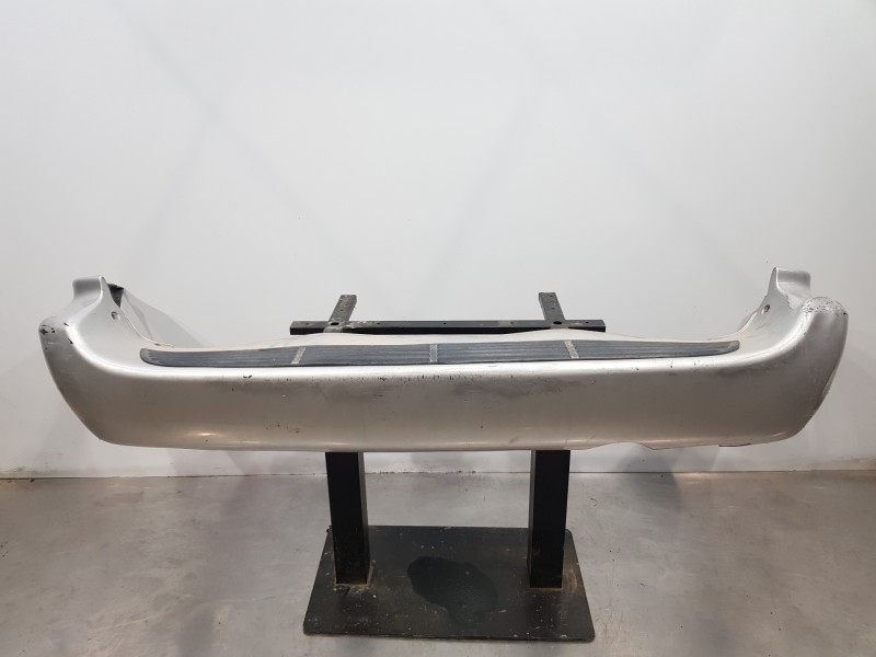 Recambio de paragolpes trasero para chrysler voyager (rg) lx referencia OEM IAM 5018631AA  