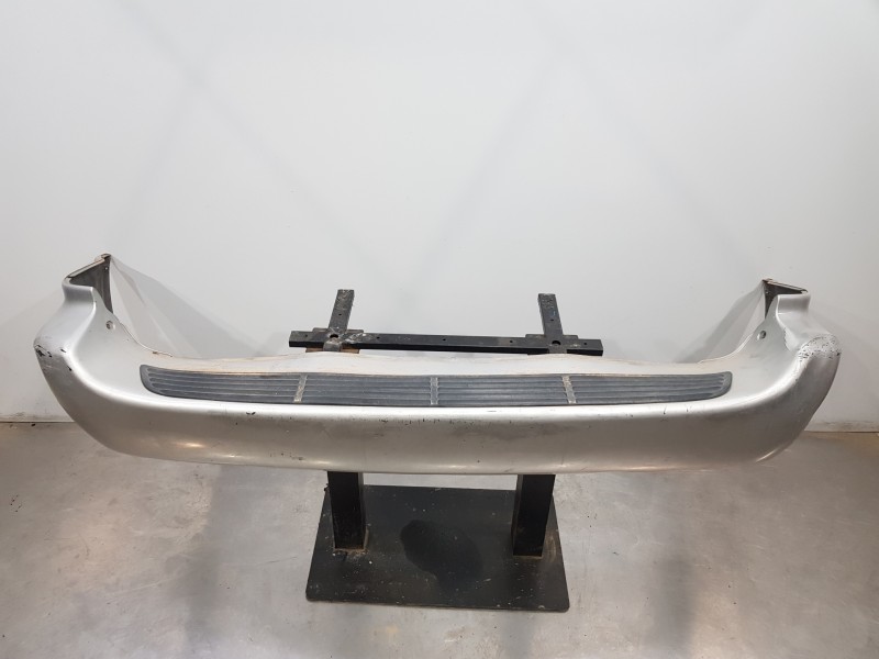 Recambio de paragolpes trasero para chrysler voyager (rg) lx referencia OEM IAM 5018631AA  