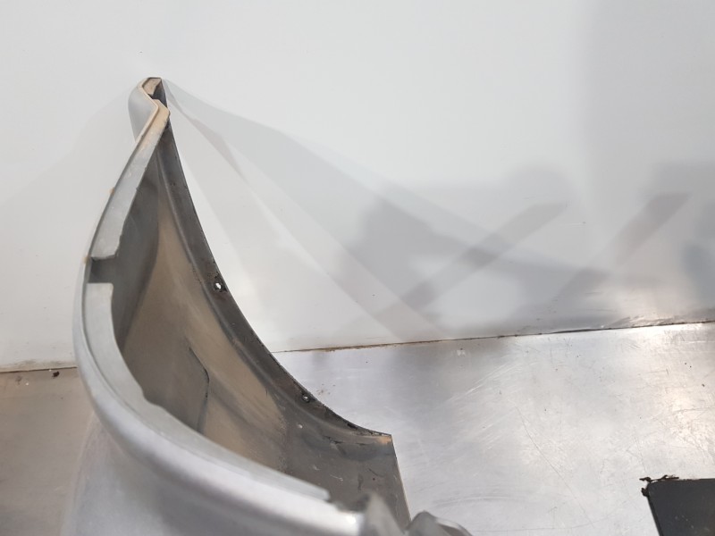 Recambio de paragolpes trasero para chrysler voyager (rg) lx referencia OEM IAM 5018631AA  