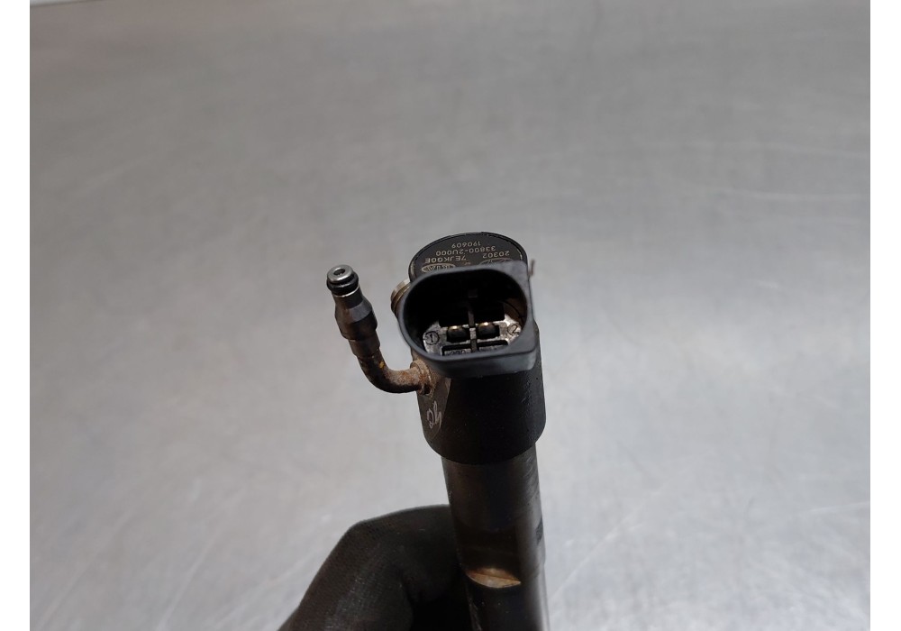 Recambio de inyector para kia sportage drive referencia OEM IAM 338002u000  