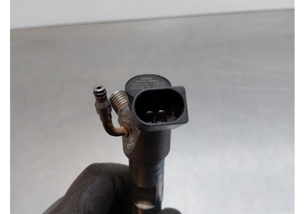 Recambio de inyector para kia sportage drive referencia OEM IAM 338002u000  