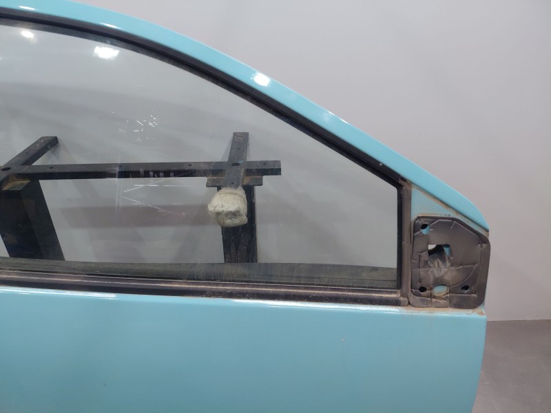 Recambio de puerta delantera derecha para renault twingo emotion referencia OEM IAM 801008682R  