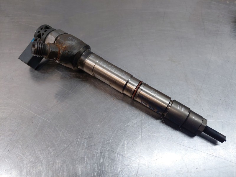 Recambio de inyector para volkswagen caddy ocio trendline bluemotion referencia OEM IAM 04L130277AC  