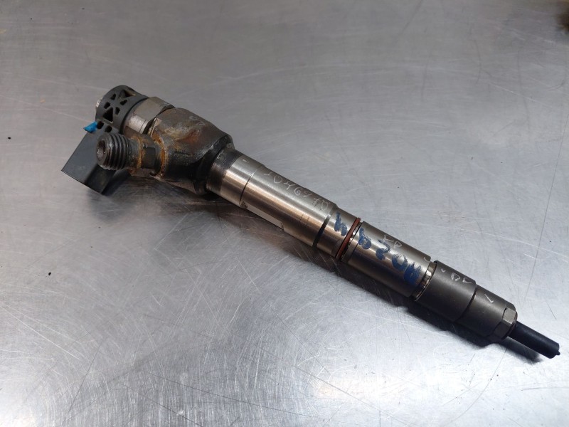 Recambio de inyector para volkswagen caddy ocio trendline bluemotion referencia OEM IAM 04L130277AC  